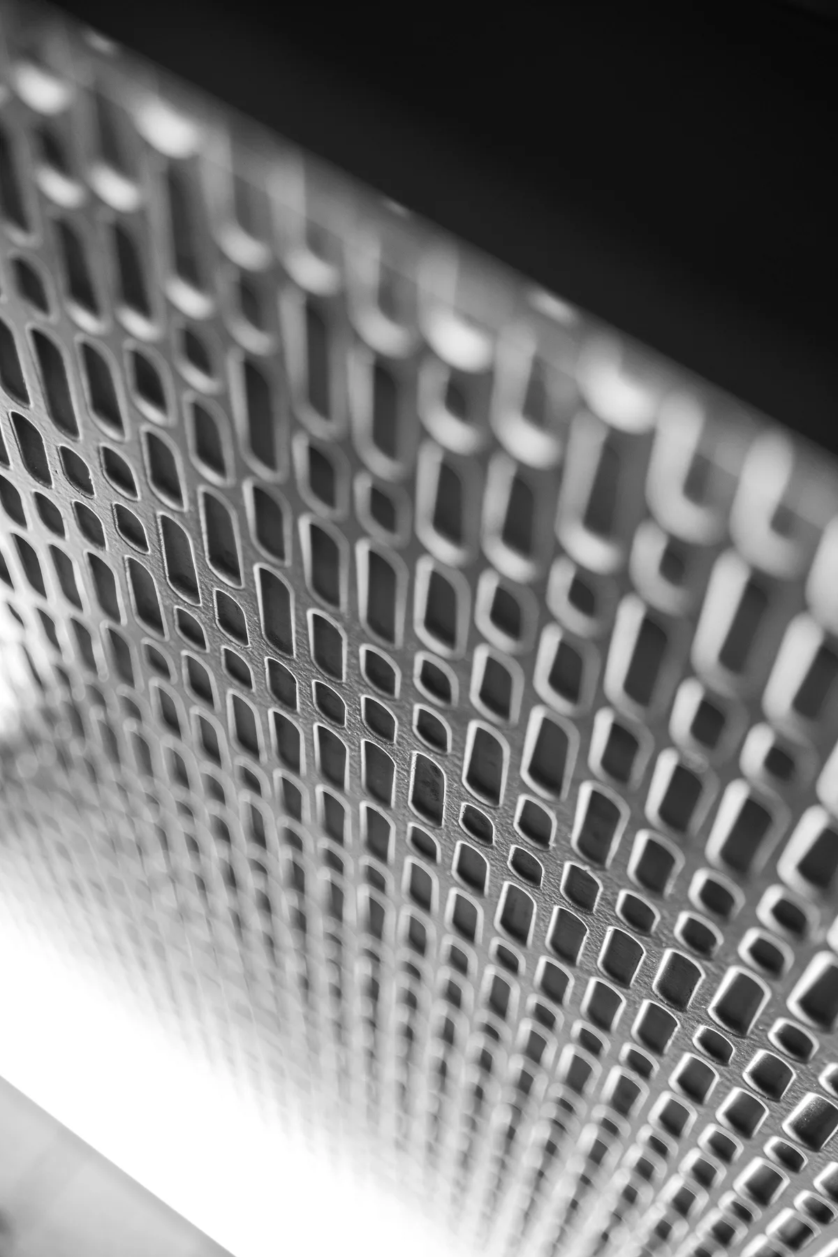 Close-up of Stereo’s patterned front and illuminated edge.